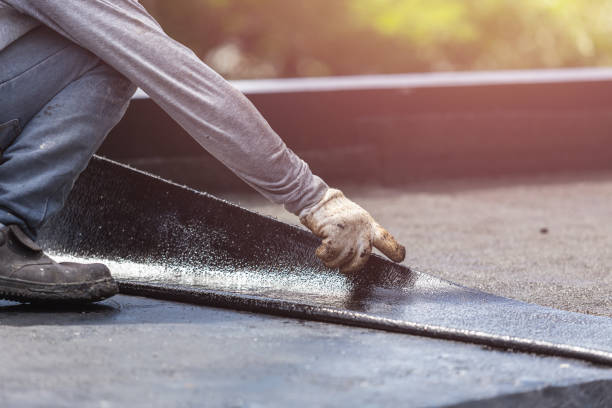 Professional Basement Waterproofing technician working in Atlantic Beach, NY